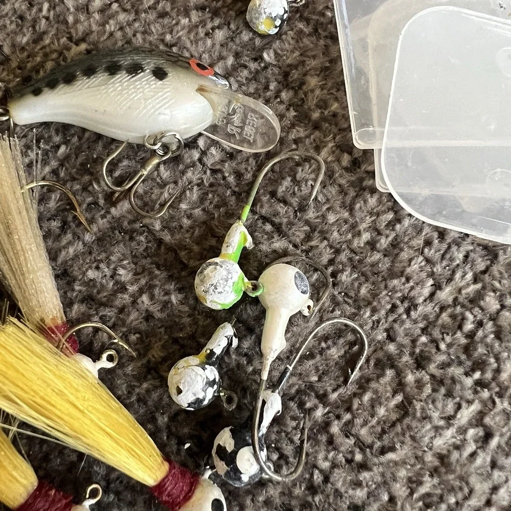 Plano Tackle Box Lot with Rebel Lure Bucktail Jigs Hooks Swivels and Hand Reel